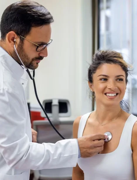 healthcare professional examining patient